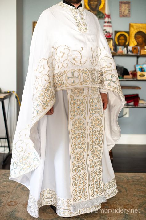 Elevate your liturgical attire with our exquisite fully embroidered Orthodox Priest Vestments Set in pristine white. Designed to embody the beauty and reverence of Orthodox tradition, this vestment set is perfect for solemn and sacred services. Features: Complete Set: Includes all essential pieces for Orthodox priestly vestments, fully embroidered with intricate and beautiful designs. Luxurious Fabric: Made from high-quality, durable fabric, ensuring comfort and longevity. Elegant White: The pur White Priest Robes, Priest Clothes, Catholic Clothing, Priest Outfit, Priest Robes, Priest Vestments, Orthodox Priest, Rat King, High Priest