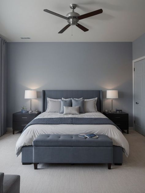 Create a soothing gray bedroom with a touch of elegance by adding a striking blue accent wall. Enhance the overall aesthetic with sleek furniture and soft lighting to achieve a modern yet inviting atmosphere. Gray And Blue Bedroom, Room Painting Bedroom, Room Color Ideas Bedroom, Blue Accent Wall, Navy Blue Bedrooms, Room Color Combination, Next Bedroom, Blue Bedroom Decor, Sleek Furniture