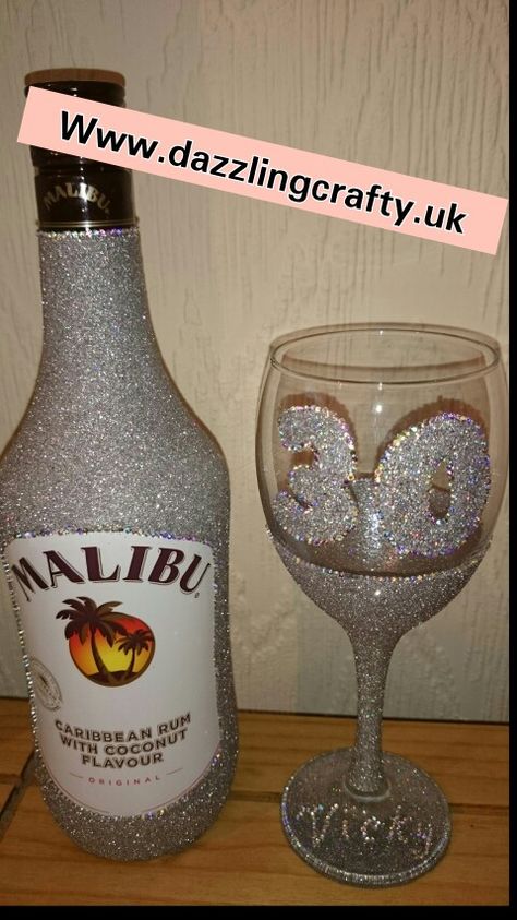 Silver glitter malibu bottle gift set complete with birthday glitter wine glass £25.00 Available from www.dazzlingcrafty.uk https://m.facebook.com/dazzlingcraftycreationsglitterglasses Glitter Malibu Bottle, Bedazzled Malibu Bottle, Malibu Bottle Decorated, Alcohol Decorations, Tequila Decor, Malibu Bottle, Smirnoff Bottle, Alcohol Bottle Decorations, Bedazzled Liquor Bottles