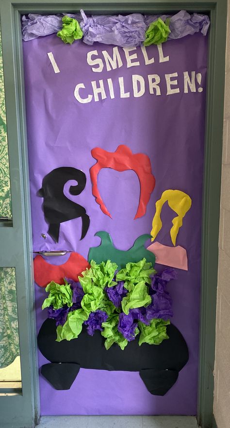 Classroom door decoration for teachers who love Halloween! #hocuspocus #craftyteacher #classroomdecorations Teacher Door Decorations Halloween, Halloween Teacher Door Ideas, Cafeteria Halloween Decorations, Halloween Teacher Door Decorations, I Smell Children Door Decoration, Office Door Decorating Contest Halloween, Halloween Cafeteria Decorations, Halloween Door Contest Ideas Classroom, Teacher Halloween Door Ideas