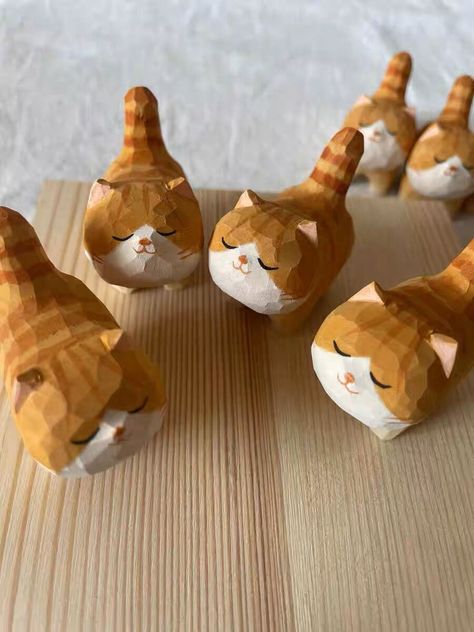 Elevate your home décor with this exclusive Gohobi Handcrafted Wooden Orange Cat Ornament. Hand-painted and carefully crafted, each piece is unique and of the highest quality. Surprise and delight the cat lover in your life with this precious piece, and enjoy its presence as a one-of-a-kind addition to your home. The price listed is for one ornament. No two ornaments are alike, embodying the pinnacle of quality and craftsmanship. Individually created by the artisan's hand, subtle variations betw Wood Carving Art Sculpture, Bird Candle Holder, Bear Sculptures, Bear Carving, Wooden Statues, Wooden Cat, Clay Art Projects, Wood Carving Art, Cat Ornament