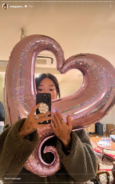 Peggy You holding a heart balloon in a mirror selfie Peggy Gou Nails, Peggy Gou Aesthetic, Peggy Gou, Coachella 2024, Random Wallpaper, Insta Feed, Human Race, Stylish Nails, A Woman