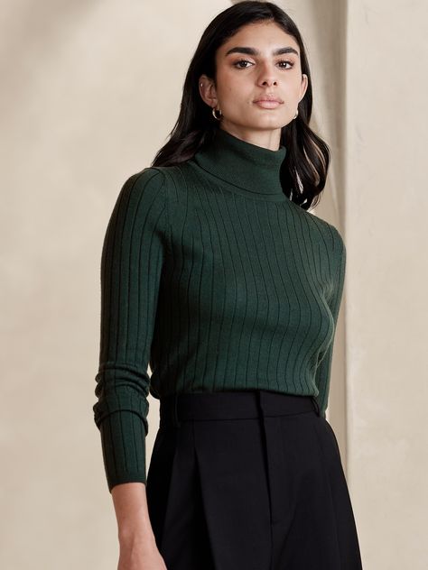 A classic turtleneck sweater, knitted from our signature extra-fine Merino wool using a ribbed-knit stitch to enhance its extra-close cut.  Slim fit.  Turtleneck.  Responsible Wool Standard Certified: This global standard protects the sheep that supply the wool for this garment as well as the land they graze, working to make it better for the environment and the sheep.  NSF Certification C0517446 Slim fit.  Long sleeves.  Hip length.  Model: Size S, 5'10" (178cm). Green Turtleneck Outfit, Turtle Neck Outfit Women, Juniper Green, Classic Turtleneck, Turtleneck Jumper, Green Turtleneck, Capsule Wardrobe Essentials, Slim Sweater, Green Turtle