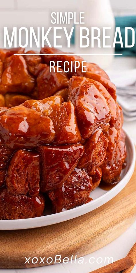 This easy monkey bread recipe uses canned biscuit dough and is sweetened with white and brown sugar and flavored with cinnamon. It's a delicious pull-apart bread that is easy to make and is sure to be a hit. This monkey bread recipe smells incredible while it cooks, and you won't be able to resist trying a bit as soon as it's ready. The melted buttery brown sugar sauce on top is especially delicious. A buttery cinnamon sugar topping makes this a delicious Pillsbury monkey bread. Money Bread Recipe, Holiday Monkey Bread, Pillsbury Monkey Bread, Easy Monkey Bread Recipe, Cinnamon Sugar Pull Apart Bread, Biscuit Monkey Bread, Homemade Monkey Bread, Brown Sugar Sauce, Monkey Bread Recipe Easy