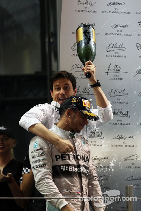 Mercedes Motorsport Director, Toto Wolff celebrates with 2014 Abu Dhabi GP race winner and World Champion Lewis Hamilton on the podium. F1 Training, Mercedes Girl, Aryton Senna, Toto Wolff, Lewis Hamilton Formula 1, F1 Lewis Hamilton, F1 Wallpaper Hd, Mick Schumacher, Formula 1 Car Racing