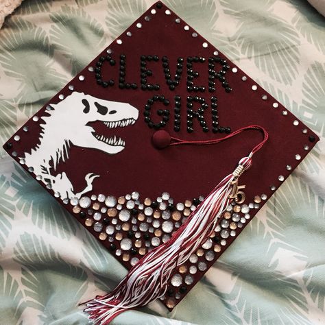 Jurassic Park Graduation Cap, Dinosaur Graduation Cap, Clever Girl Jurassic Park, Creative Graduation Caps, Graduation Hats, College Grad Cap Ideas, Graduation Cap Decoration Diy, High School Graduation Cap, College Graduation Cap Decoration