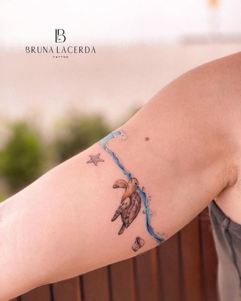 220+ Most Beautiful Hawaii Tattoo Ideas and Designs (2023) - TattoosBoyGirl Braslet Tattoo, Sea Waves Tattoo, Sea Tattoos For Women, Ocean Animal Tattoos, Strand Tattoo, Tropisches Tattoo, Small Turtle Tattoo, Beachy Tattoos, Dolphin Tattoo