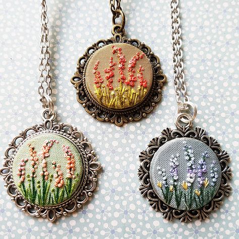 A garden of embroidered pendants. #embroidery #gardenembro… | Flickr Hand Embroidered Jewelry, Garden Embroidery, Miniature Embroidery, Diy Broderie, Embroidered Necklace, Pola Sulam, Brazilian Embroidery, Embroidery Flowers Pattern, 자수 디자인