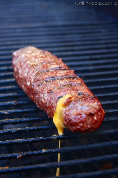 Hamburgers rolled into large hot dog shapes, stuffed with a cheese stick and cooked on the grill | Cheese Stick Burger Dogs | https://grillinfools.com Grilled Cheese Sticks, Hamburger Rolls, Grill Cheese, Burger Mix, Beef Ribs Recipe, Cheese Stick, Grilled Oysters, Burger Dogs, Beef Hot Dogs