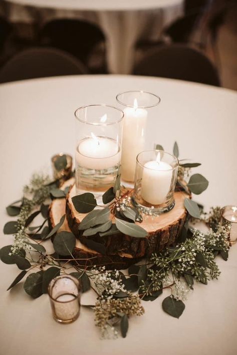 Woods Centerpiece Wedding, Rustic Candle Centerpieces Wedding, Wedding Table Decorations Wood Slices, Wood Rounds Wedding Centerpieces, Natural Table Centrepiece, Wedding Wood Slabs Centerpieces, Outdoorsy Wedding Table Decor, Wood Log Centerpiece, Sage Green And Wood Wedding Theme