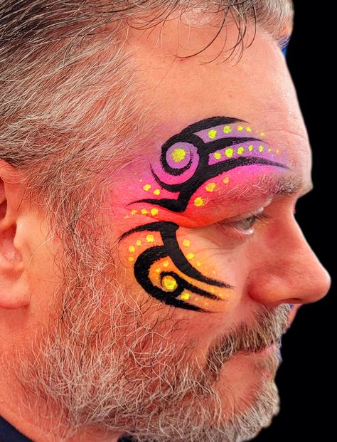 When they want the tyson tattoo but tarted up version😁 Eye Design Face Paint, Face Paint Line Busters, Disco Face Paint, Festival Face Paint Ideas, Men Face Painting, Character Face Paint, Face Painting Adults, Full Face Painting, Mens Face Paint