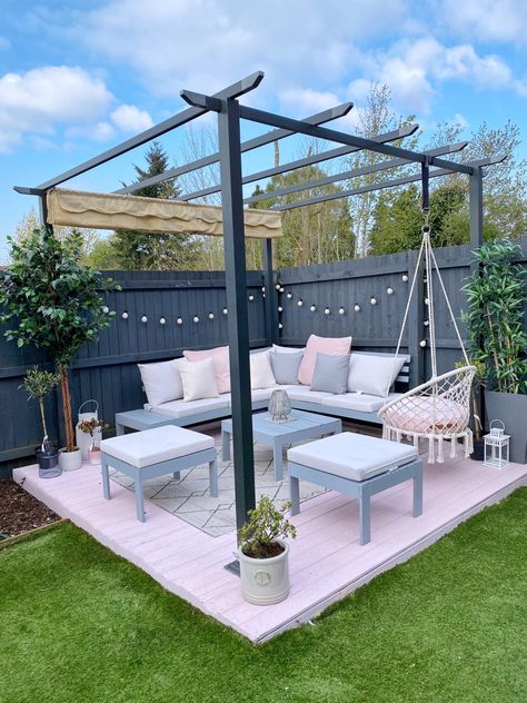 A photograph of the corner of my garden showing an area of decking painted pink. On the decking is a grey garden corner sofa and a steel pergola with canopy. Dream Backyard Patio, Pergola Backyard, Garden Sitting Areas, Patio Small, Back Garden Design, Patio Garden Design, Backyard Remodel, Outdoor Gardens Design, Apartment Balcony