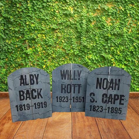 These **Handmade Decorative Tombstones** are the perfect spooky addition to your **Halloween decor**. Each set is crafted using **recycled blue pine making them not only durable but also eco-friendly. The tombstones are **cut to shape stained with an all-weather **grey finish and printed with UV-resistant inks, ensuring their longevity and outdoor durability. ### **Unique Features - **Eco-friendly Materials Made from recycled blue pine, each tombstone has unique characteristics such as knots and Diy Wooden Gravestones, Funny Tombstone Names, Tombstone Designs Halloween Decorations, Skeleton Ideas, Tombstone Diy, Tombstone Designs, Blue Pine, Halloween Props Diy, Halloween Tombstones