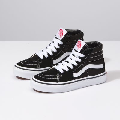 The Sk8-Hi, Vans legendary lace-up high top inspired by the classic Old Skool, has a durable suede and canvas upper, a supportive and padded ankle, and Vans vulcanized signature Waffle Outsole. Black High Top Vans, Nike Kids Shoes, Sk8 Hi Vans, Tenis Vans, Dr Shoes, Vans Kids, Black And White Shoes, Kids Fashion Clothes, Black High Tops