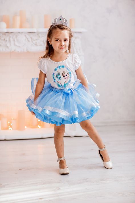 Excited to share the latest addition to my #etsy shop: Birthday Princess Elsa Tutu Outfit, Frozen Birthday Tutu Set, Elsa Frozen 5th Birthday, Personalized Tutu Outfit https://etsy.me/2ChrWsF #odeda #dladetej #dlamalyej #sinij #hat #serebranyj #rodestvo #denrodena #no Frozen Tutu Dress, Frozen Birthday Outfit, Elsa Outfit, Elsa Tutu, Frozen Tutu, Frozen 6, Elsa Birthday Party, Frozen 3, Frozen Outfits