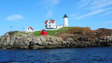 York’s hilltop guide (Credit: Kelly Young) Nubble Lighthouse Nubble Lighthouse Maine, Lighthouse Maine, Nubble Lighthouse, York Maine, Maine Lighthouses, Honeymoon Spots, Beautiful Lighthouse, Dark Places, Travel And Leisure