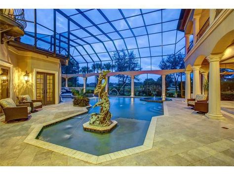 Luxury mansion with courtyard pool with glass covering.  Patio surrounds the large courtyard pool. Swimming Pool Ideas, Amazing Swimming Pools, Courtyard Ideas, Indoor Pool Design, Courtyard Pool, Swimming Pool Decks, Luxury Swimming Pools, Indoor Swimming Pool, Glass Pool