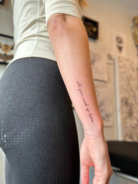 Tattoo Placement Ideas Forearm, Arm Tattoo Placement Words, Arm Tattoos For Women Letters, Writing Down Forearm Tattoo, Side Arm Cursive Tattoo, Side Arm Tattoos For Women Quotes Small, Tattoo Writing On Forearm, Text Forearm Tattoo, Quote Wrapped Around Arm Tattoo