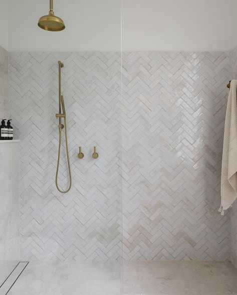 Bathroom Inspiration via @ambathrooms featuring our hand made Bejmat tiles laid in herringbone pattern 🤍 #bathroomstyle #luxurybathrooms #bathroomsofinstagram #herringbone #handmadetiles #bathroomstyling #tiles #shower #dilorenzotiles Pattern Tiled Bathroom, Porcelain Herringbone Tile, Marble Herringbone Shower Tile, Feature Bathroom Tiles, Tile Ideas For Bathroom Floor, Cream Herringbone Tile Bathroom, Fishbone Tiles Bathroom, Herringbone Tiles Bathroom, Feature Tiles Bathroom