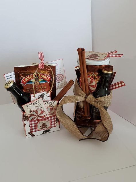 Grown Up Hot Cocoa Gift set with Baileys and recipe. Comes with hot chocolate mix, Baileys, cinnamon sticks, cookies and extra tags for notes etc. I used the hot cocoa apron shaped favor treat box and embellishments. https://www.etsy.com/ca/listing/878963534/printable-apron-style-favor-box?ga_search_query=hot%2Bcocoa&ref=shop_items_search_1&pro=1 This is an incredibly quick gift that you can personalize with ribbon, your choice of liqueur and cookies. Hot Cocoa And Baileys Gift, Hot Chocolate And Baileys Gift, Diy Hot Chocolate Gifts Basket, Baileys Christmas Gift, Baileys Gift Ideas, Boozy Hot Chocolate Gift, Baileys Hot Chocolate Gift, Drink Gift Basket, Hot Chocolate Gift Basket