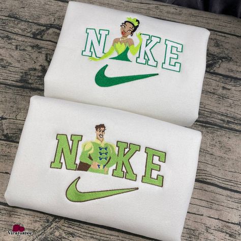 Cute Tiana Princess And Prince Naveen Disney Nike Embroidered Sweatshirts, Disney Nike Embroidery Matching Couple Check more at https://viralustee.com/product/cute-tiana-princess-and-prince-naveen-disney-nike-embroidered-sweatshirts-disney-nike-embroidery-matching-couple/ Naveen Disney, Princess Tiana Birthday Party, Disney Nike, Sweet 15 Ideas, Tiana Birthday Party, Princess Hoodie, Tiana Princess, Princess And Prince, Nike Embroidery