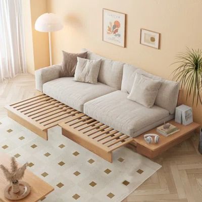 Everly Quinn Aljandro 137.8'' Sofa Chaise | Wayfair Sofa Bed Japandi, Wooden Sofa Set Designs Modern, Bed Japanese Style, Japandi Couch, Sofa Set Designs Modern, Airbnb Amenities, Japandi Sofa, Japanese Sofa, Sofa Design Ideas