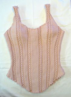 This corset style top was named for Isambard Kingdom Brunel, an English engineer best known for his innovative solutions to long-standing engineering problems which revolutionized public transport and modern engineering. After all, what greater feat of engineering is there than a Victorian corset? Knit it in a pastel color and use a ribbon for a soft romantic or even a sexy boudoir look or try a dark color and a leather thong for a steampunk or pirate look. Isambard can be worn over a blouse... Knitted Corset Pattern, Knit Corset Pattern, Victorian Knitting, Knit Corset Top, Pirate Look, Knit Corset, Isambard Kingdom Brunel, Summer Knitting Patterns, Victorian Corset