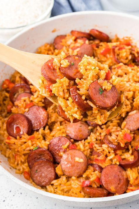 Smoked sausage and rice is an easy dinner that is made fast with your favorite sausage, peppers, rice, and flavorful seasonings! This quick and easy weeknight meal is perfect delicious comfort food for the whole family. Smoked Sausage And Rice, Smoked Turkey Sausage, Sausage And Rice, Sausage Recipes For Dinner, Smoked Sausage Recipes, Sausage Dinner, Sausage Peppers, Sausage Dishes, Fast Dinner Recipes