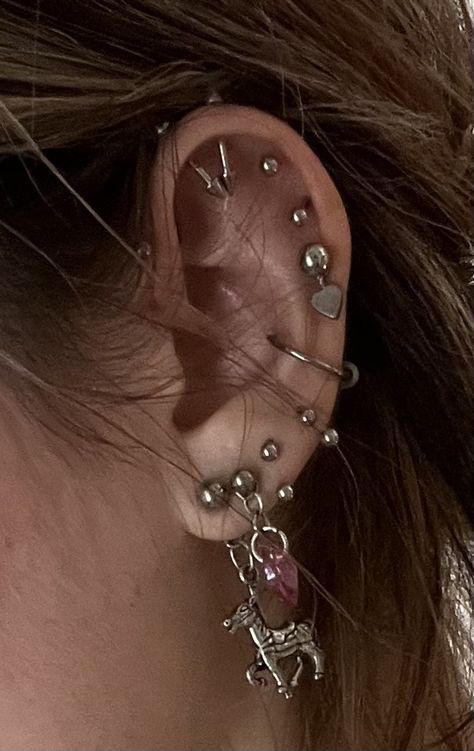 Ear Piercings Dark Aesthetic, Crowded Ear Piercings, Maximalist Piercings, Small Gauged Ears, Ear With Lots Of Piercings, Edgy Ear Piercings Aesthetic, Grunge Ear Piercings, Fully Pierced Ears, Black Ear Piercings