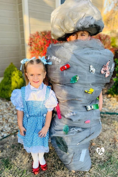 A little girl is dressed up like Dorothy from Wizard of Oz, and her older brother standing next to her is dressed up like a tornado. Tornado Costume Kids, Tornado Costume, Sibling Halloween Costumes, Sibling Costume, Diy Halloween Costume, Matching Halloween, Costume Diy, Halloween 2024, Diy Halloween Costumes