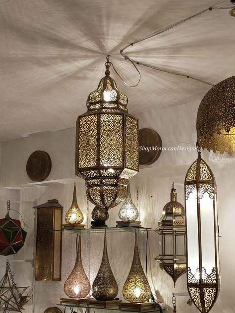 Moroccan chandelier, hanging Moroccan lantern, Moroccan light, pendant light, Moroccan lamp, housewarming gift, home lighting, home decor. This Moroccan light is perfect for your place to make it more Inviting and Luxurious. It casts a soft and a stunning pattern on the walls like an illuminated wallpaper. ~This Light is: High quality craftsmanship and premium brass. Easy to install and hang on ceiling. suitable for USA and Western wiring. Comes with the chain, canopy, and bulbs. ~Light Measurem Moroccan Ceiling Light, Moroccan Chandelier, Moroccan Ceiling, Moroccan Lantern, Traditional Pendant Lighting, Moroccan Lighting, Moroccan Lamp, Moroccan Lanterns, Lighting Home