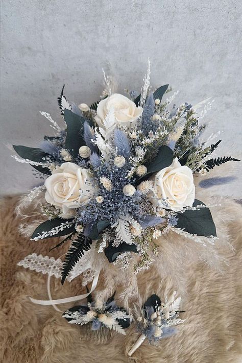 This seasonal bouquet could be charming for your big day. From my love of weddings, this floral selection pairs beautifully with any winter ceremony. Save this bouquet to your wedding board. Winter Wedding Bouquet Blue, Winter Wedding Bouquet White, Blue And Gray Wedding, Navy Wedding Bouquet, Flower Centrepieces, Winter Ceremony, Winter Bridal Bouquets, Blue Flowers Bouquet, Blue Winter Wedding