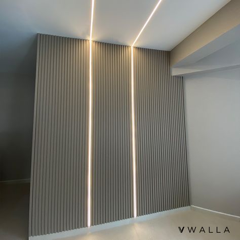 Custom-made LED fittings integrate seamlessly with our fluted panels, creating a stunning feature wall for your living space 🤩 Fluted Panel Series: 176 Fluted Panel Color: FPS-809 💬 DM us to obtain our wall coverings catalog Fluted Wall Panel With Mirror, Fluted Wall Panel Ideas, Grey Fluted Panel, Fluted Panel Texture, Fluted Ceiling, Fluted Panel Wall, Fluted Panel Design, Mirror Panelling, Fluted Wall Panel