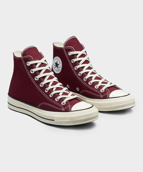 Converse has updated the premium Chuck 70 with durable 12oz vintage canvas in a new Warm Burgundy red. The Chuck 70 mixes the best details from the ’70s-era Chuck with impeccable craftsmanship and premium materials. An elevated style icon, it features lightweight cushioning to keep you looking—and feeling—good all day. Crafted in a recycled poly-canvas for an elevated feel. Premium cushioning provides all-day comfort and support. New Converse colors to refresh your rotation. Shiny, taller rubber Converse Colors, Burgundy Converse, Marauders Dr, Mcu Dr, Random Clothes, 70s Era, New Converse, Elevated Style, Converse Chuck 70