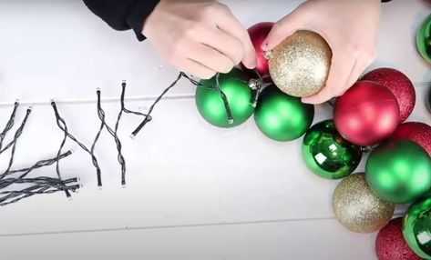 Ornament Garland DIY | Hometalk Christmas Tree Out Of Lights, Diy Ornament Garland, Ornament Garland Diy, Diy Christmas Ball, Outdoor Garland, How To Make Garland, Dollar Store Christmas Crafts, Christmas Lights Garland, Diy Christmas Garland