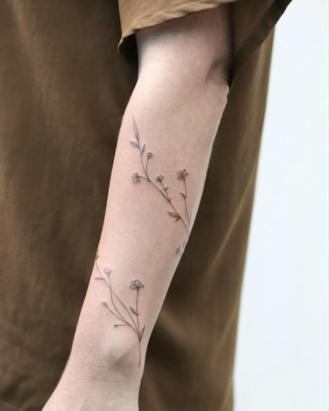 Wrapping wildflower vine  🌿#wildflowers #fineline Tattoo Over Scarring, Vine Armband Tattoo, Arm Wrap Around Tattoos For Women, Fine Line Flower Vine Tattoo, Fine Line Vine Arm Tattoo, Arm Scar Tattoo, Tattoo On Scar, Vine Forearm Tattoo, Sleeve Floral Tattoo