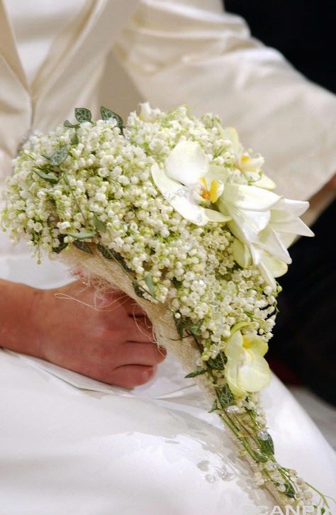 Cascading Wedding Bouquet Showcasing: White Lily Of The Valley, White Lilies, White Dendrobium Orchids, White Phalaenopsis Orchids + Green Trailing Ivy White Lily Of The Valley, White Dendrobium Orchids, Orchids White, Lilies White, Bridal Cuff, Cascading Wedding Bouquets, Wedding Party Flowers, Unique Bouquet, Dendrobium Orchids