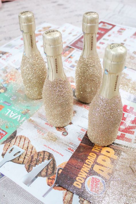 how to decorate alcohol bottles with glitter, mini glitter bottle diy tutorial, popular diy blogger Stephanie Ziajka, popular DIY blog Diary of a Debutante Glitter Inside Bottle Diy, Glitter Mini Bottles, Gold Glitter Champagne Bottle, Diy Gifts With Alcohol, How To Decorate Alcohol Bottles, How To Decorate Tequila Bottles With Glitter, Pink Glitter Champagne Bottle, Glitter Bottles Diy Alcohol, Cute Liquor Bottles