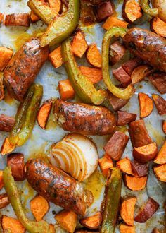 Sheet Pan Roasted Sausage with Sweet Potatoes and Peppers - get this easy dinner recipe at barefeetinthekitchen.com Roasted Sausage, Pan Cooking, Sausage Dishes, Sheet Pan Suppers, Sheet Pan Dinners Recipes, Pan Dinners, Sausage And Peppers, Easy Dinner Recipe, Spicy Sausage