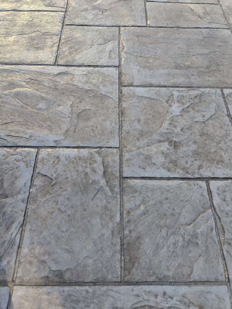 Stamped Concrete Stepping Stones, Stamped Concrete Paver Look, Imprinted Concrete Patio Ideas, Stamped Colored Concrete Patio, Stamped Concrete Stone Look, Stamped And Stained Concrete, Stamped Concrete Porch Farmhouse, Stamped Concrete Patio Ideas With Steps, Stamped Concrete Slate Look