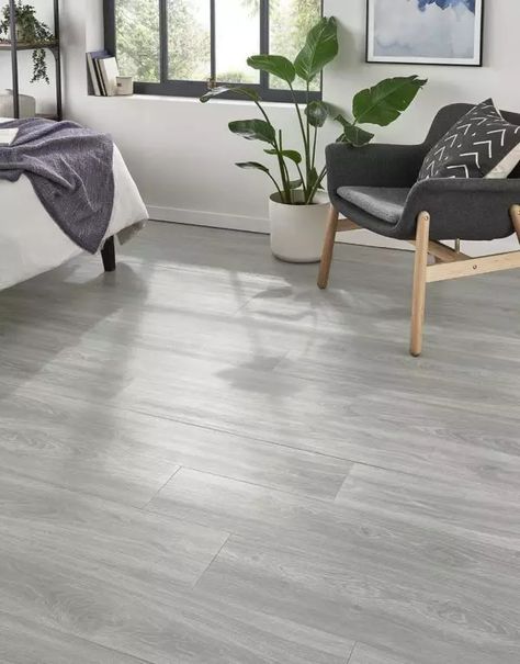 There are more than 500 shades of gray and even more design possibilities. Make the most of this color with our standout gray flooring ideas. Grey Floorboards Living Rooms, Tiles Design For Hall, Gray Floors Bedroom, Grey Wood Floors Bedroom, Light Grey Wood Floors, Grey Flooring Living Room, Garage Suite, Light Grey Flooring, Grey Wooden Floor