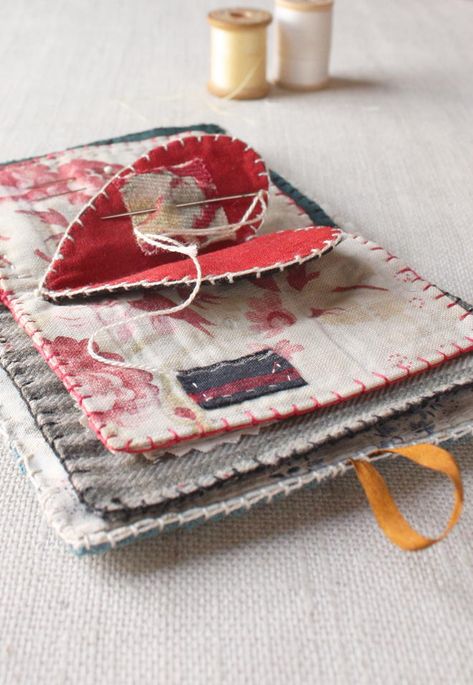 &quot;Stitch a sweet needle book from the scraps you can&#39;t part with. The pattern includes templates and full instruction for a palm size needle book with 4 pages including the cover and heart at the center. The little book will certainly hold your pins and needles and tools or it could tell a story, mark an occasion, like a birth or anniversary, or be a sort of travel journal, the pages filled with little things found along the way and saved.&quot; Ann Wood, Needle Cases, Beginner Sewing Projects Easy, Sewing Needles, Needle Book, Leftover Fabric, Sewing Projects For Beginners, Sewing Skills, Love Sewing