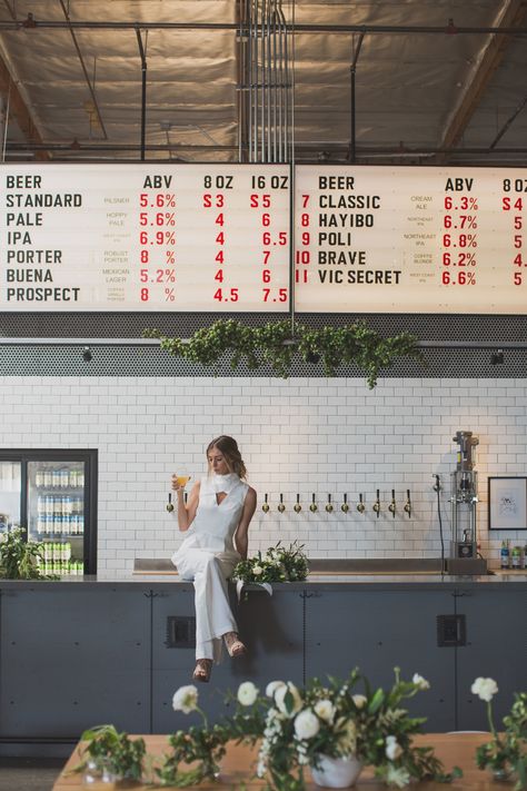 If you and your Fiancé love beer just as much as you love each other, why not get married at Madewest Brewery in Ventura? #love #beer #brewerywedding #venturawedding #madewest #beerontap #edgy #tabledecor #wedding #styledshoot #modernwedding #chicwedding #smallwedding #inspiration #greenery #florals #bardesign #barinspiration #ceremony #indoorwedding #weddingvenue Wedding Welcome Party Brewery, Brewery Reception Ideas, Brewery Welcome Party, Wedding At Brewery, Engagement Party Brewery, Brewery Bridal Shower Ideas, Brewery Engagement Party, Brewery Rehearsal Dinner, Brewery Reception