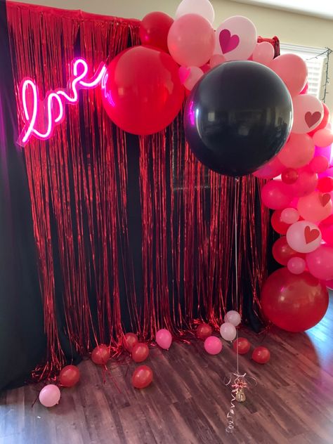 Used a balloon arch set, photo booth stand, black cloth for background, and red door decoration. Displayed light up “love” sign, hung by fishing line. Valentine Day Gender Reveal Ideas, Valentines Gender Reveal Party, Gender Reveal Ideas Valentines Day, Gender Reveal Valentines Day, Valentines Theme Gender Reveal, Valentine Gender Reveal Ideas, February Gender Reveal Ideas, Valentines Gender Reveal Ideas, Valentines Day Gender Reveal