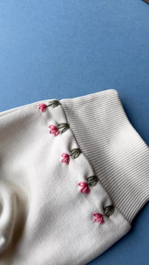 Spring Blooms 🌷 . . #sustainableclothing #handmadestyle #embroideryinstaguild #dmcembroidery #sewing #embroideryart #embroideryhoop… | Instagram Trendy Hand Embroidery Designs, Embroidery Simple Design Flower, Simple Embroidery On Sweatshirt, Easy Clothing Embroidery Ideas, Easy Embroidery Sweatshirt, Simple Embroidered Designs, Sewing On Clothes Ideas, Hand Embroidering Clothes, Simple Clothes Embroidery