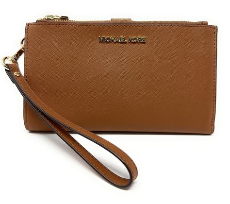 PRICES MAY VARY. Inside: 1 Large billfold, 1 Phone case slot w/ secure button closure, 1 window ID slot, 6 credit card slots & 2 multi purpose slot compartments inside Michael Kors lettering logo front center Double top zip closure & secure button closure to hold closed the wallet Size Approx. 7.25" W x 4.5" H x 1" D, w/ 7" removable wristlet strap IMPORTANT : Style Made Only For MK Outlet, Does Not Include Box or Duster Bag Inside: 1 Large billfold, 1 Phone case slot w/ secure button closure, 1 Michael Kors Rfid-blocking Rectangular Wallet, Michael Kors Rfid Blocking Rectangular Wallet, Michael Kors Rfid-blocking Wallet, Michael Kors Brown Wallet With Interior Card Slots, Brown Michael Kors Wallet With Interior Card Slots, Michael Kors Wallets With Card Slots For Daily Use, Michael Kors Travel Wallet, Michael Kors Classic Wallet For Daily Use, Michael Kors Travel Wallet Rectangular