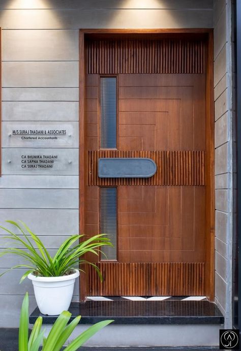 Office Design and Space Planning followed by Unique Artistic Outlook in this C.A Firm  | Studio Ankit Pahuja - The Architects Diary Wood Main Door Design, Teak Wood Main Door Design, Teak Wood Main Door, Wood Main Door, Modern Entrance Door, Front Wall Design, House Main Door Design, Exterior Wall Tiles, Main Entrance Door Design