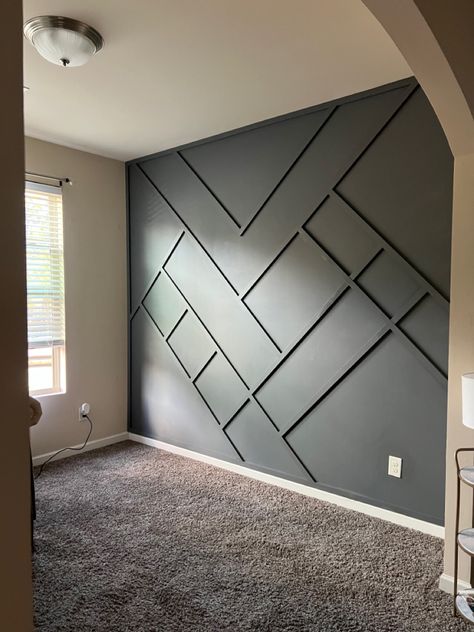 Custom feature wall in Behr’s “Dark Ash” matte finish. Trim Wall Design, Unique Wall Design, Yellow Bed, Trim Wall, Black Feature Wall, Grey Accent Wall, Accent Wall Designs, Wall Tv Unit Design, Wooden Console