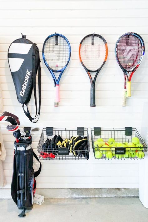 How To Store Balls In Garage, Tennis Racket Storage Ideas, Tennis Racket Storage, Garage Diy Organization, Organizing Ideas Garage, Sport Equipment Storage Ideas, Garage Tool Organization Ideas, Organize Garage Ideas, Organized Garage Ideas