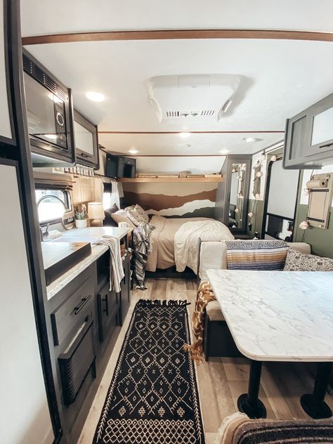 Aspen Trail Camper Makeover by @rad.ronda.rv Small Camper Living Room Ideas, Rv Bedroom Renovation Ideas, Aspen Trail Camper Remodel, Neutral Camper Interior, Small Rv Bedroom Ideas, Camper Bedroom Remodel Travel Trailers, Small Camper Renovation Diy, Small Rv Decor, Trailer Bedroom Remodel